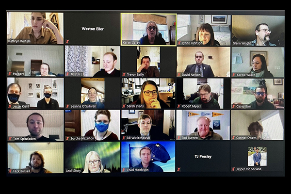 a screen share shot of many users inside a Zoom call.